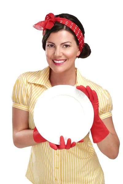Young beautiful woman housewife showing perfect washed dishes — Stock Photo, Image