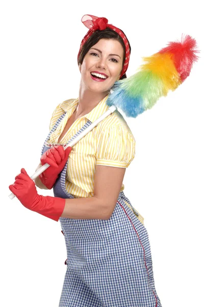 Young happy beautiful woman maid dusting on white — Stock Photo, Image