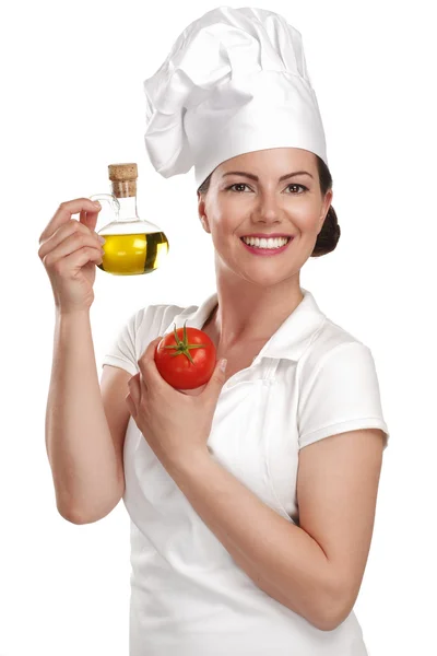 Young woman chef showing ingredients for italian food — Stock Photo, Image