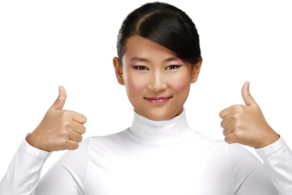 Beautiful happy asian girl showing thumbs up — Stock Photo, Image