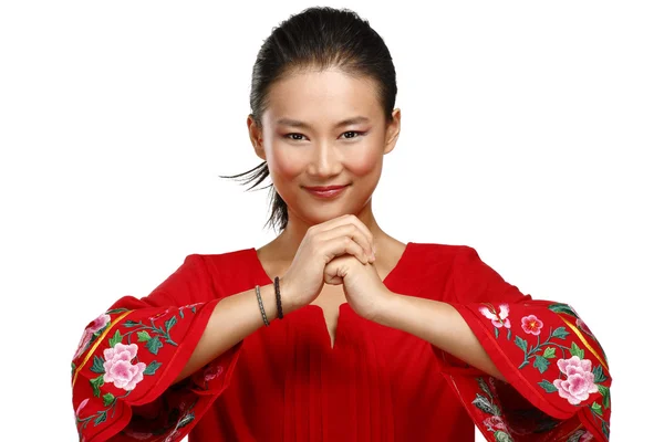 Cinese donna saluto gesto in elegante abito rosso — Foto Stock