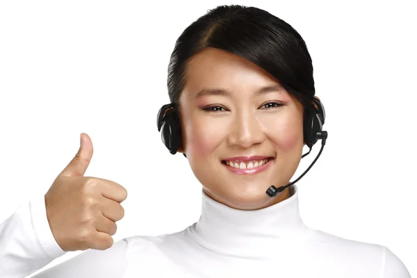 Spokojený úsměv ženské asijské zákazníkům služby operátora — Stock fotografie