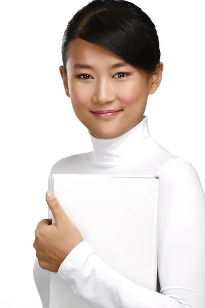 Hermosa asiático chino chica mostrando un blanco libro —  Fotos de Stock