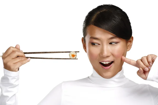 Chinês mulher mostrando asiático comida usando chopstick — Fotografia de Stock