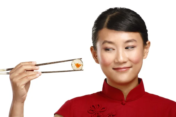 Chinese woman showing asian food using chopstick — Stock Photo, Image