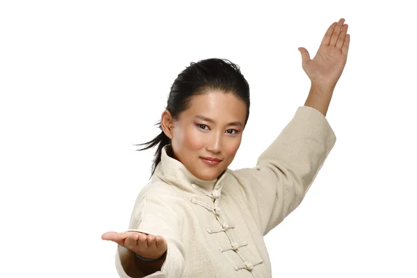 Beautiful asian woman make kung fu gesture — Stock Photo, Image