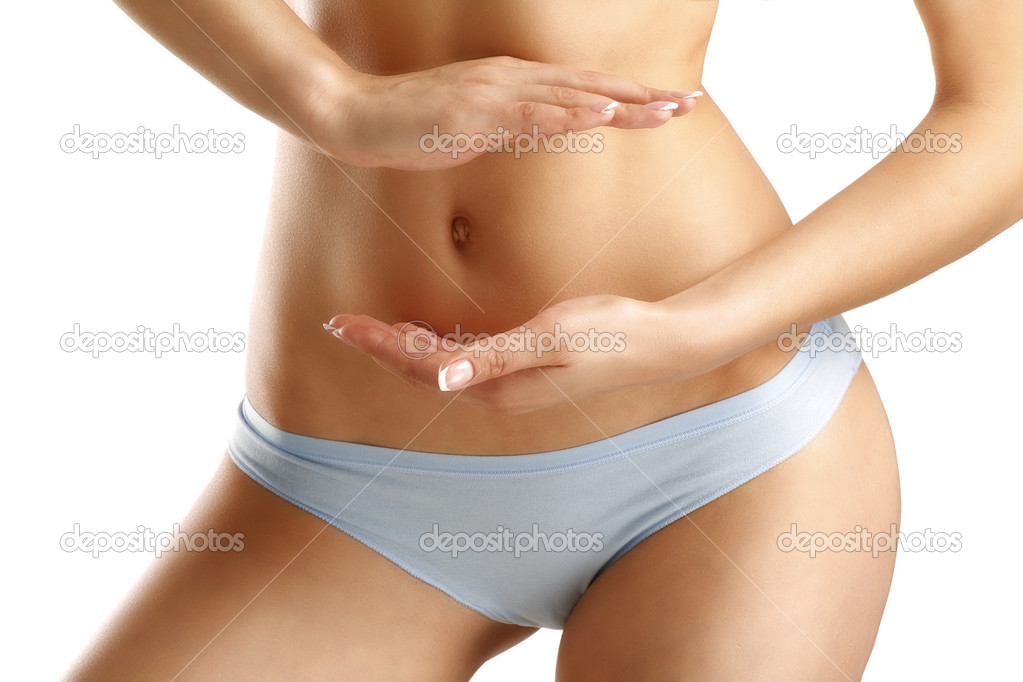 Girl make a healtcare gesture on her stomach