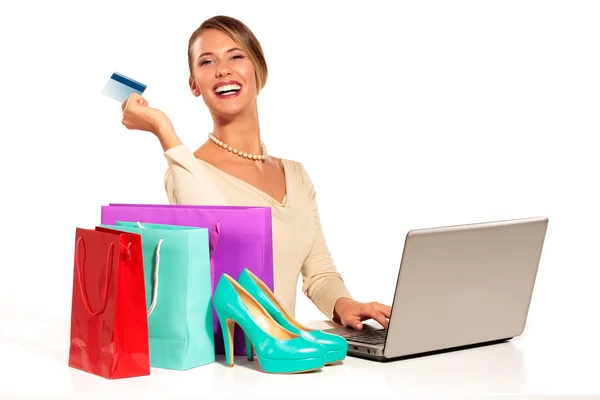 Young Woman Sitting at the desk  shopping Online — Stock Photo, Image