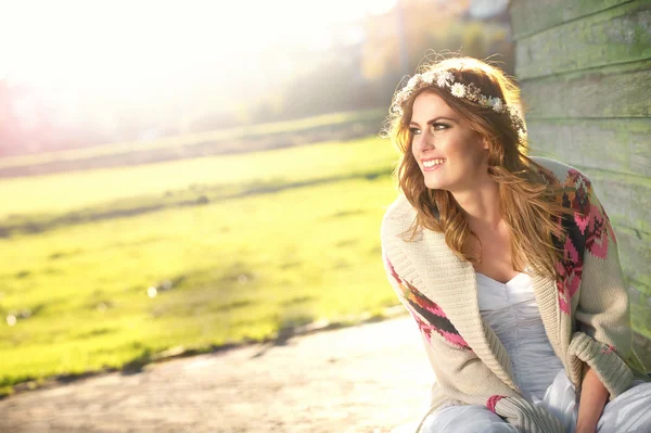 Sitting and Smiling Fashion Model — Stock Photo, Image