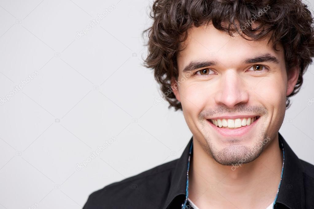 Young Handsome Man Smiling at You