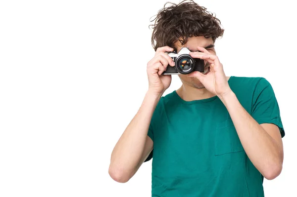 Jovem tirando foto com câmera — Fotografia de Stock