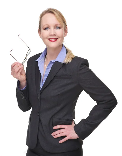 Portrét podnikatelka drží brýle — Stock fotografie