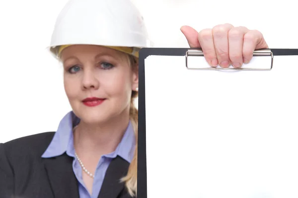 Portrait of a businesswoman holding clipboard with blank paper — Stock Photo, Image