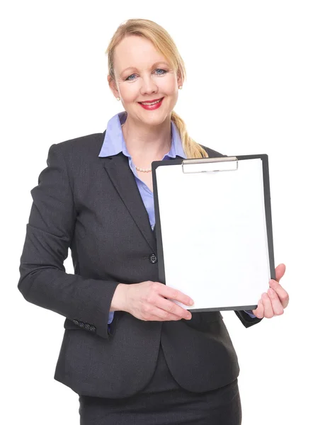 Portrait of a businesswoman showing empty sign clipboard — Stock Photo, Image