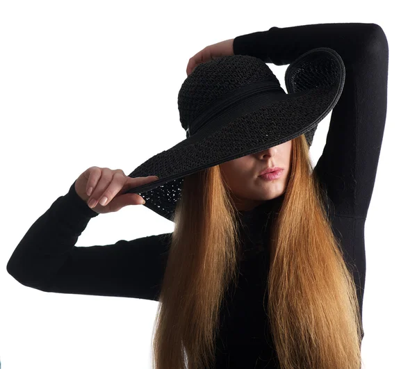 Close up portrait of a female fashion model posing in black hat — Stock Photo, Image