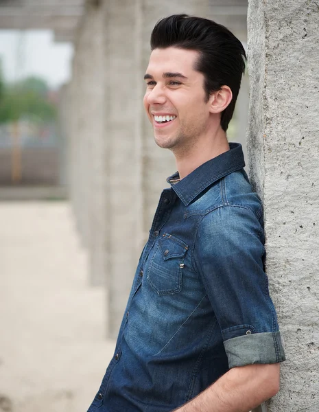 Confident young man standing outdoors — Stock Photo, Image