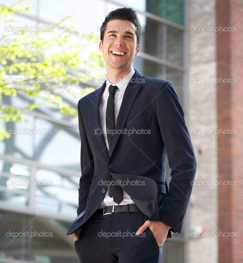 Happy businessman walking to work