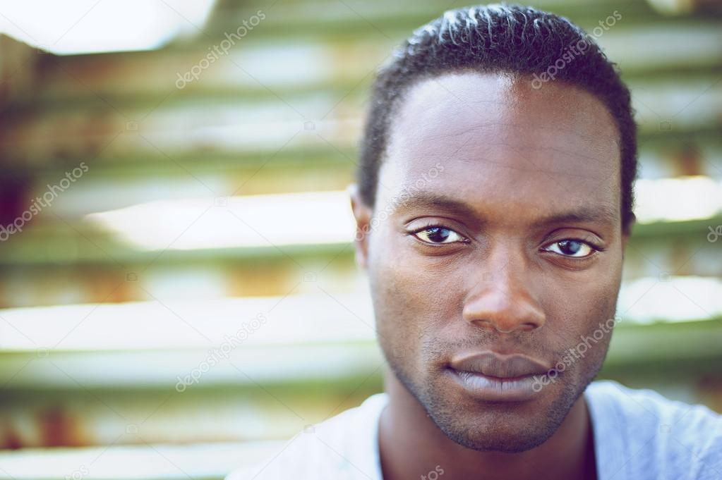 Portrait of a handsome black man looking at camera