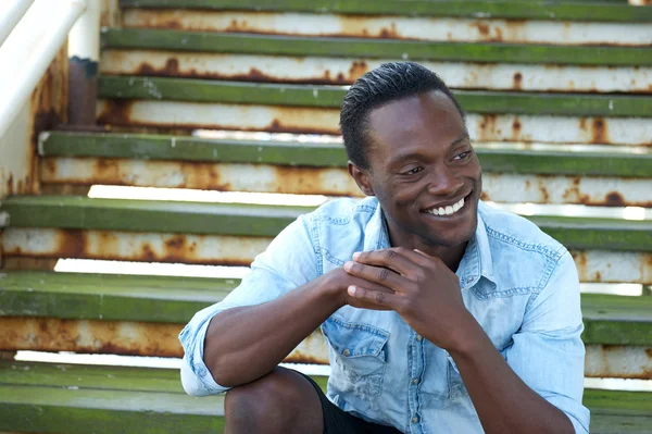 Handsome black man laughing outdoors — Stock Photo, Image