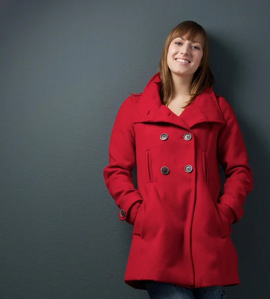 Attractive female in red winter jacket — Stock Photo, Image