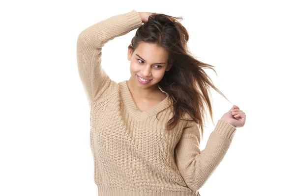 Menina bonito sorrindo com as mãos no cabelo — Fotografia de Stock