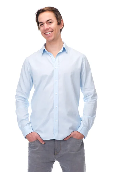 Relaxed young man smiling on isolated white background — Stock Photo, Image