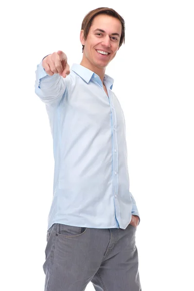 Parmak işaret ve gülümseyerek olumlu bir genç adam — Stok fotoğraf
