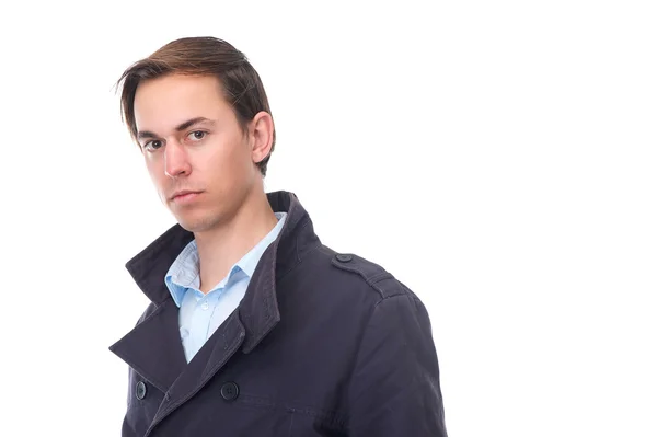 Portret van een jonge man in blauwe jas close-up — Stockfoto