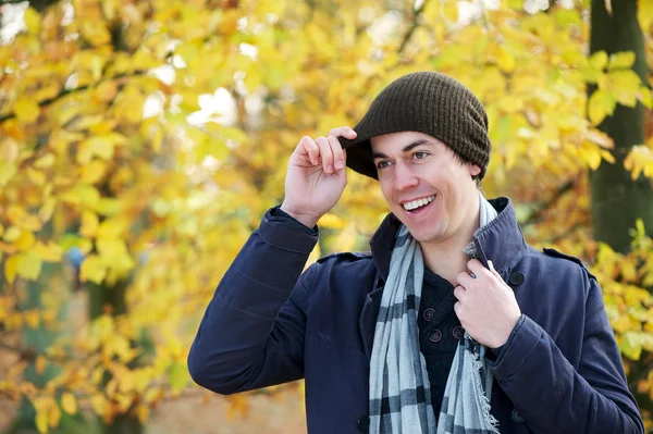Portrait of a man smiling outdoors in warm clothing — Stock Photo, Image