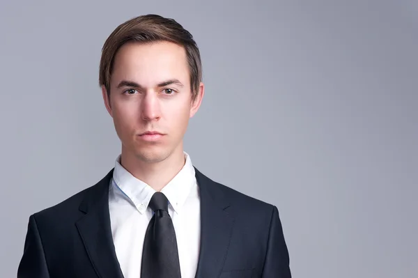 Close up portrait of a serious business man face — Stock Photo, Image