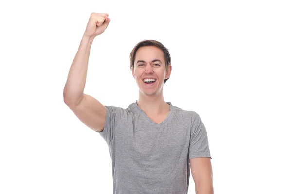 Close up portrait of a man with arm raised up in celebration — Stock Photo, Image