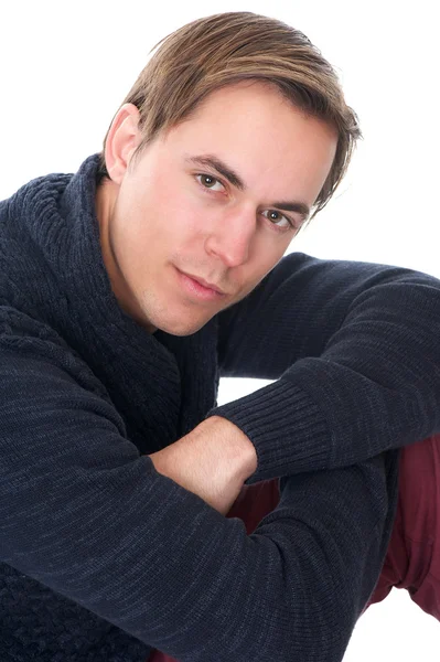 Close up portrait of a handsome young man sitting — Stock Photo, Image