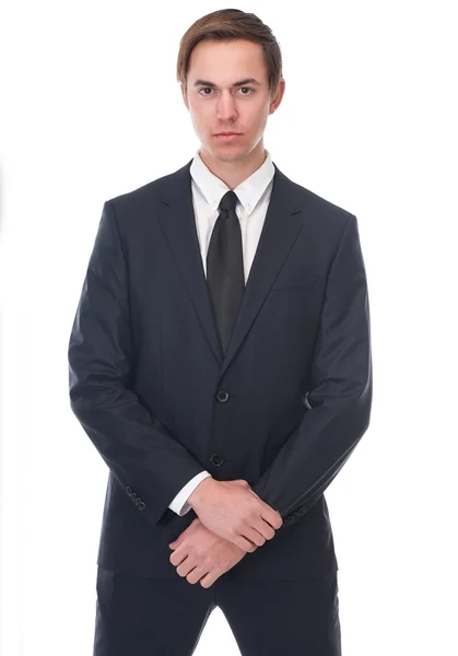 Empresario posando en traje formal negro con corbata — Foto de Stock