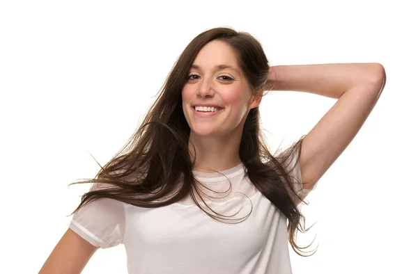 Щасливі молода жінка з руки в волосся — Stok fotoğraf