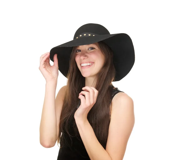 Attractive young female fashion model smiling with black hat — Stock Photo, Image
