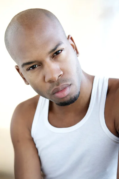 Handsome young black man in white shirt — Stock Photo, Image