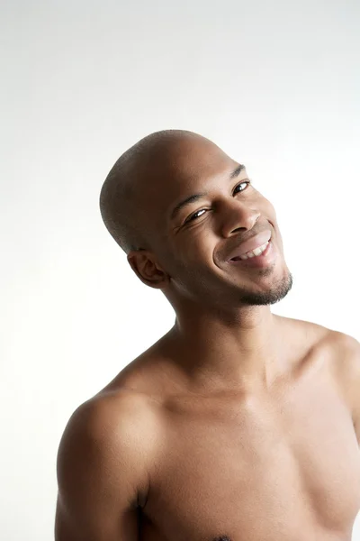 Portrait of a shirtless man smiling — Stock Photo, Image