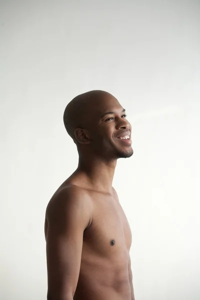 Profile portrait of a smiling black man — Stock Photo, Image