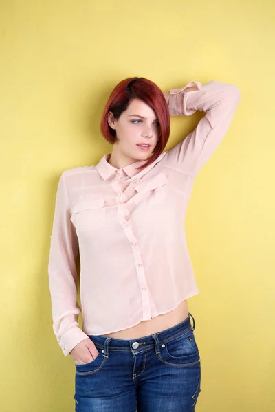 Female fashion model posing with hand in hair — Stock Photo, Image