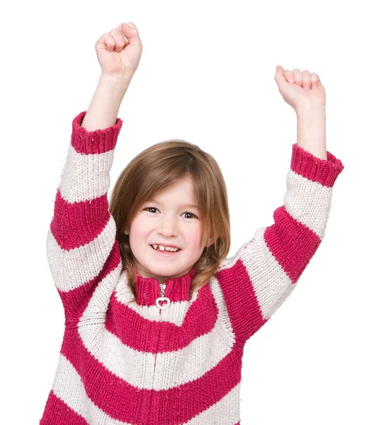 Adorable young girl with arms raised in success — Stock Photo, Image