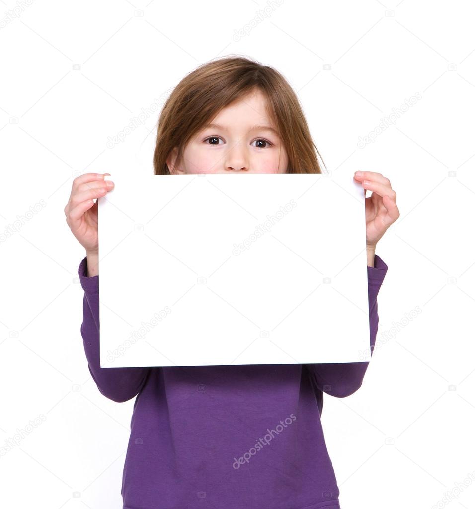 Portrait of a young girl holding blank sign
