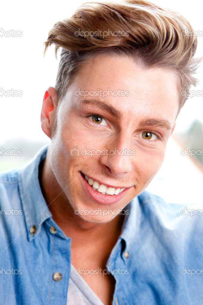 Confident young man smiling