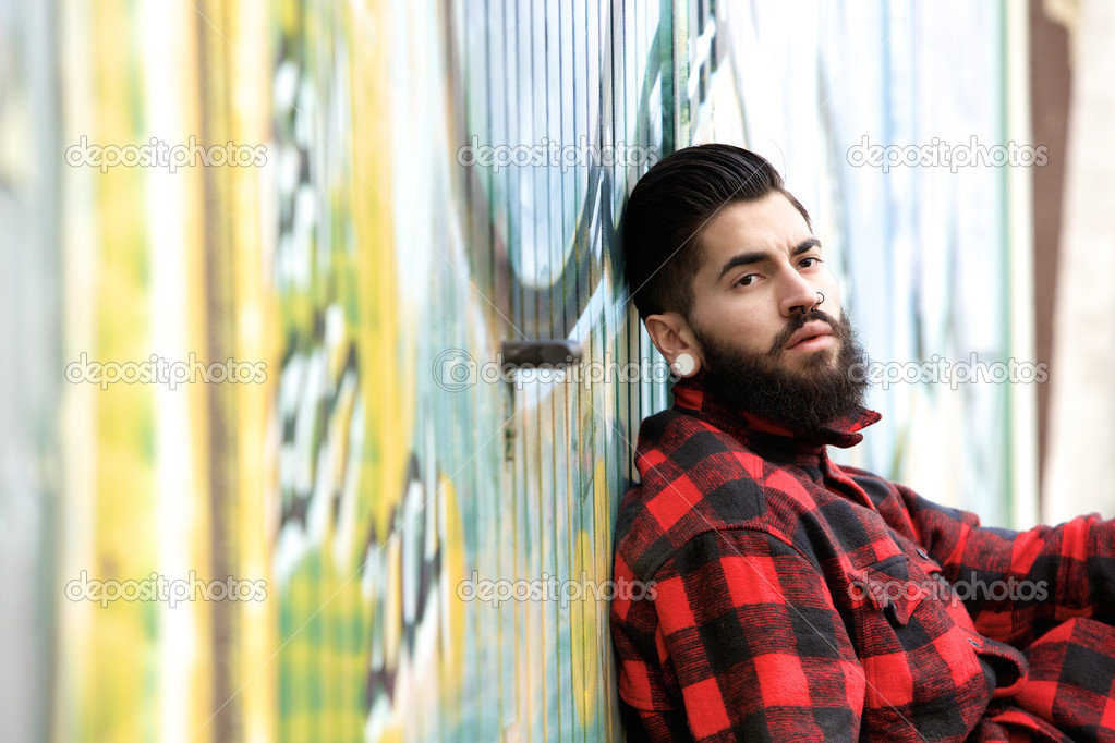 Man with beard and piercings 