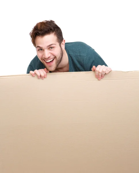 Laughing man holding blank poster — Stock Photo, Image