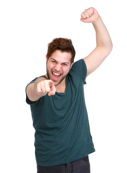 Cheerful young man pointing finger — Stock Photo, Image