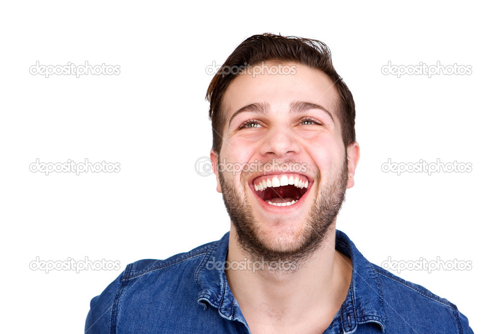 Cheerful young man laughing