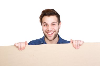 genç adam tutarak boş poster 