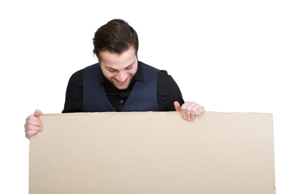 Man looking down on blank poster — Stock Photo, Image