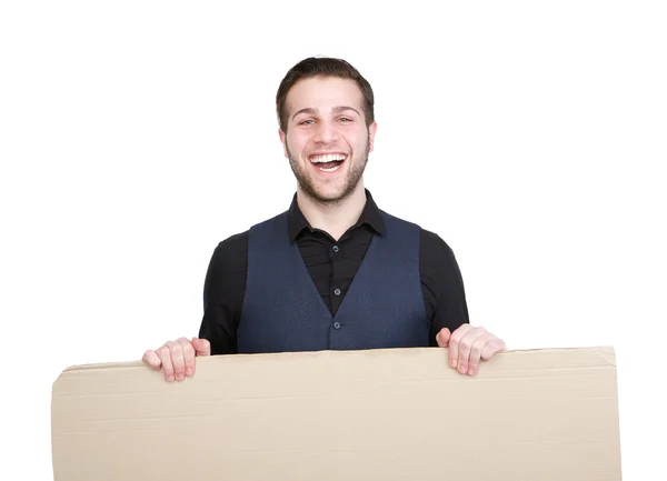 Happy young man with blank poster sign — Stock Photo, Image