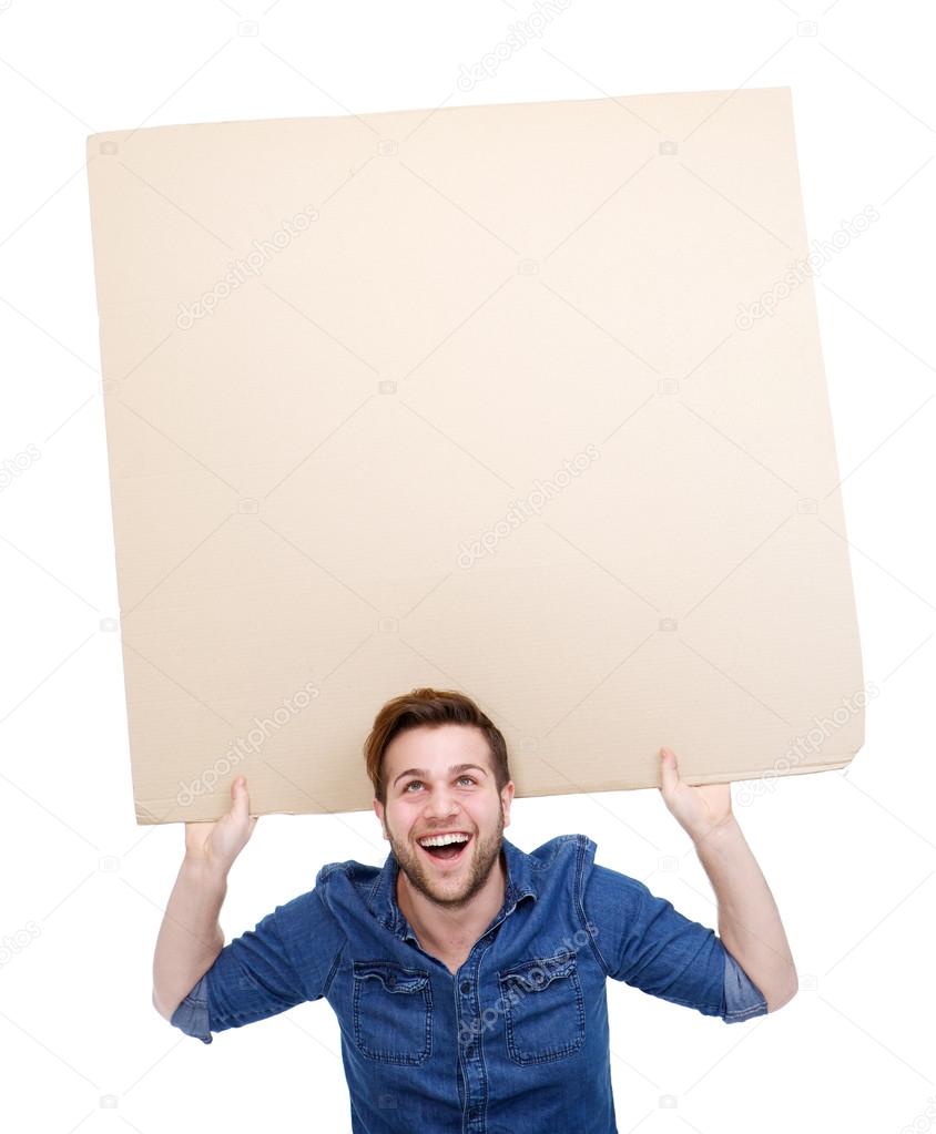 Man holding up blank poster sign
